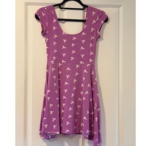 Purple dress with bird pattern.